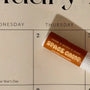 Best lip balm flavors including salted caramel and wild cherry, displayed on a January 2025 calendar