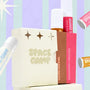 Space Camp flavored lip balm set featuring flavors like Salted Caramel and Strawberry Frosting with retro-inspired packaging