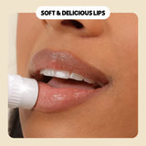 Close-up of a woman applying lip balm for soft & hydrated lips