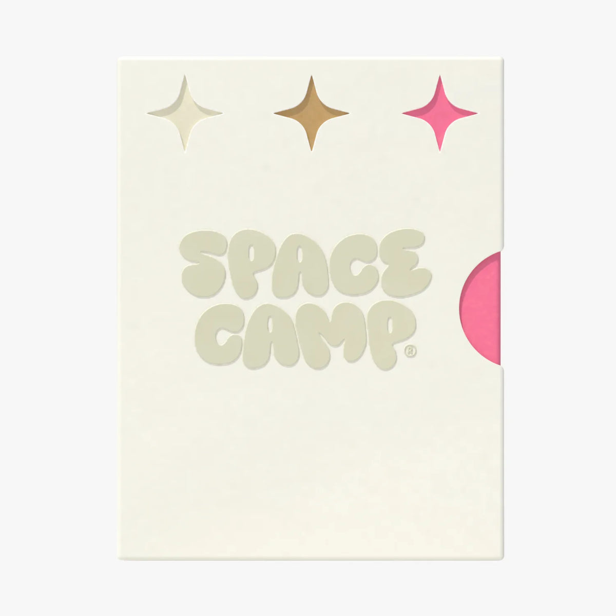A Space Camp branded card with sparkle graphics and a pink lip balm tube peeking from behind.