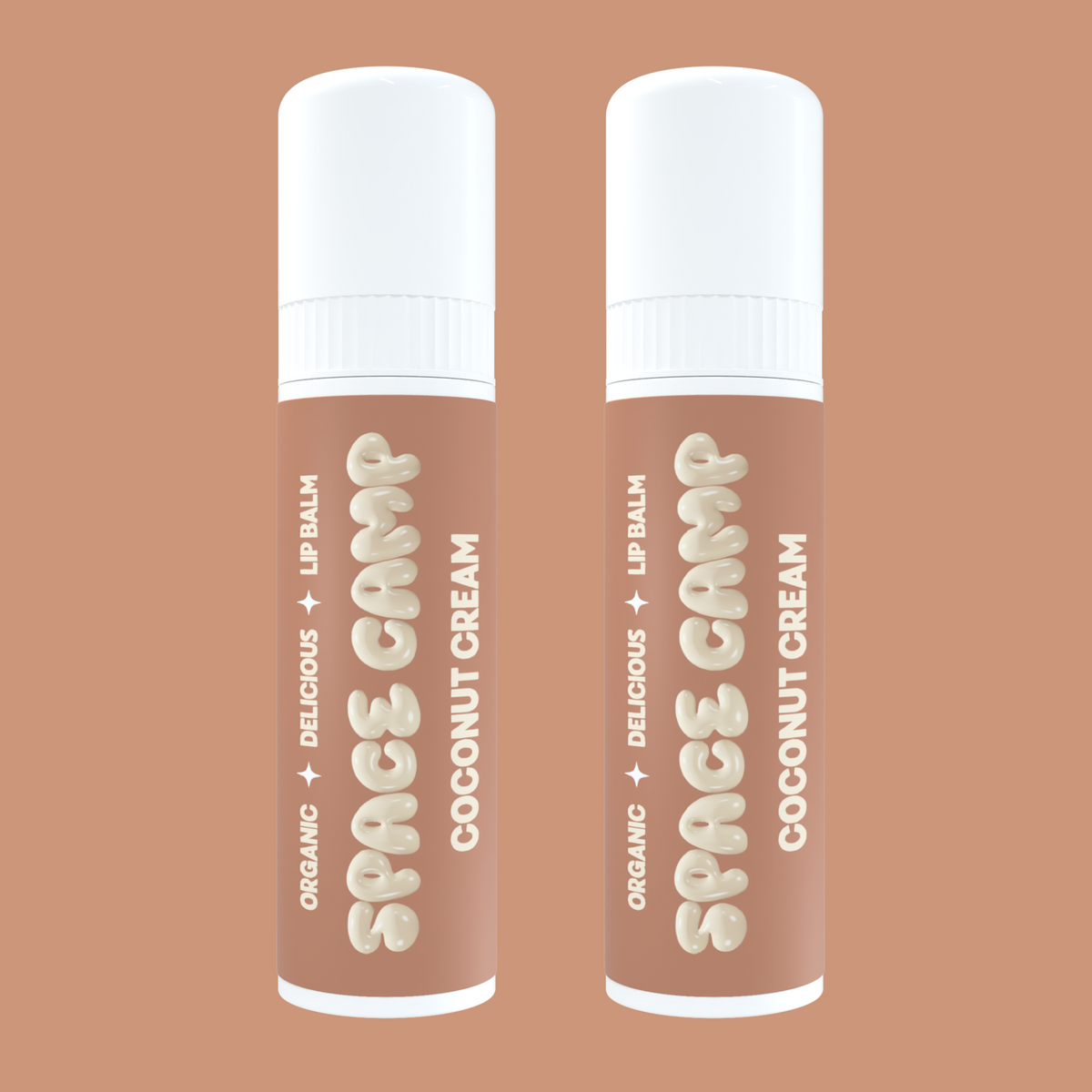 Space Camp Coconut Cream lip balms with brown packaging displayed on a matching tan background.