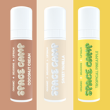 Space Camp organic lip balms in Coconut Cream, Sweet Vanilla, and Tropical Pineapple flavors displayed on neutral and vibrant backgrounds.