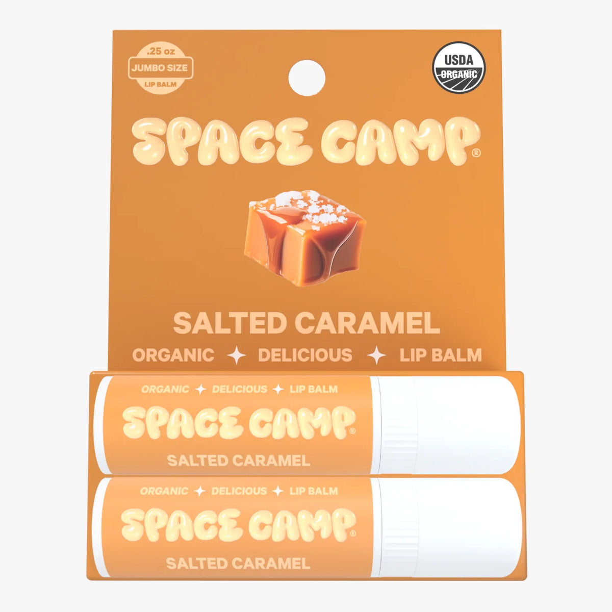 Space Camp Salted Caramel lip balm jumbo size packaging with two tubes and a caramel candy illustration.