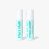 Two Space Camp Frosted Mint organic lip balm tubes with mint green labels and white caps on a light blue background.