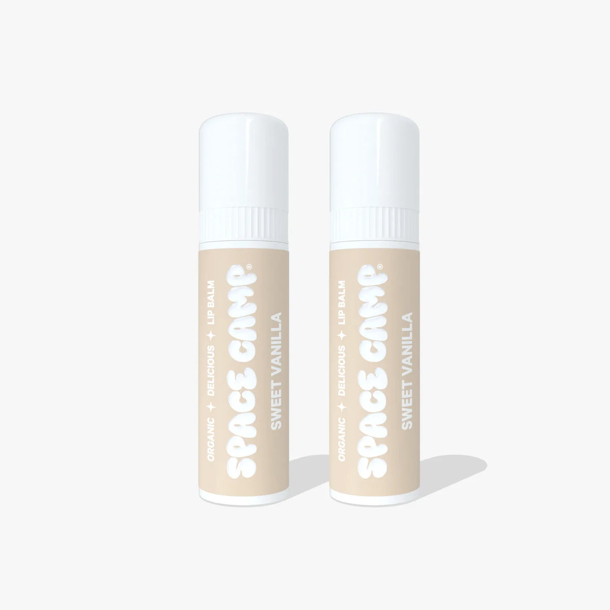 Two Space Camp Sweet Vanilla organic lip balm tubes standing side by side on a white background.